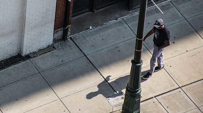 A man lose the job and walking on the street