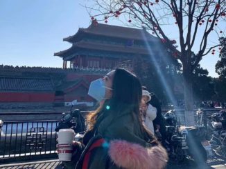 Crystal wearing a facemask in Beijing