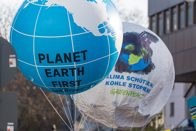 Greenpeace organisation raises big balloons with Planet Earth first message on it